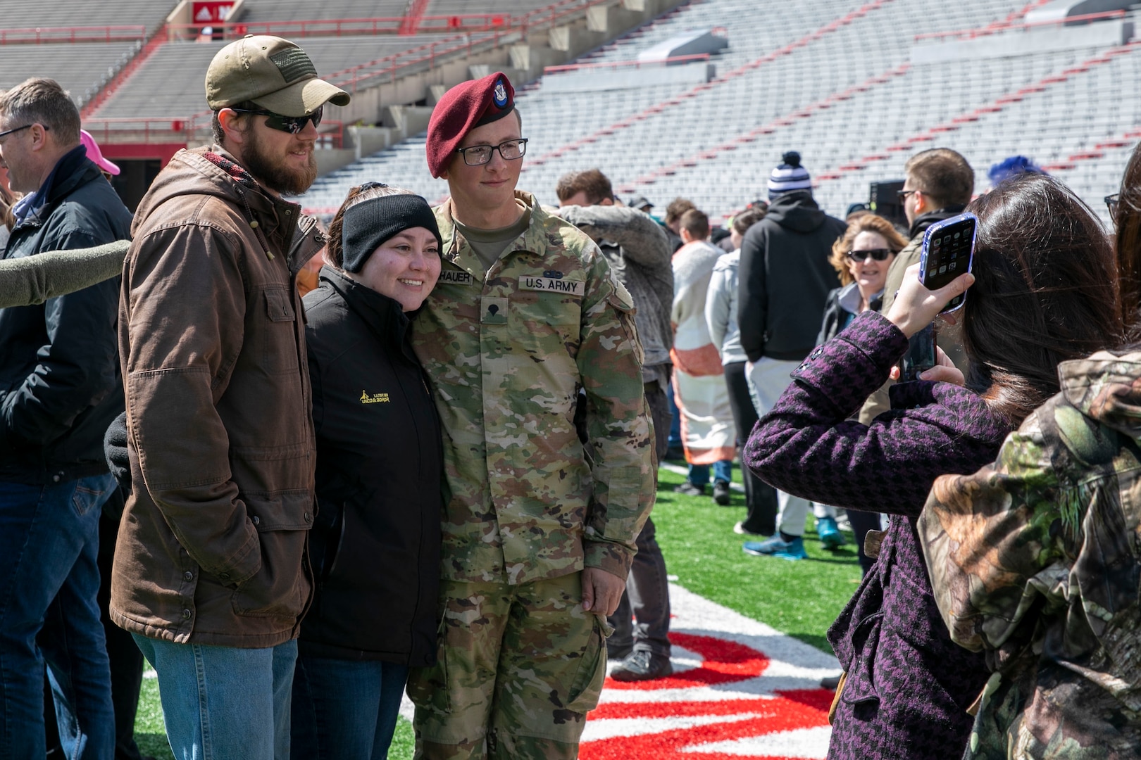 Friends, family and colleagues gathered together April 16, 2023, at Memorial Stadium in Lincoln, Nebraska, for a send-off ceremony for 131 Nebraska National Guard Soldiers of Alpha Company, 2-134th Infantry Battalion (Airborne).