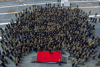 Vice Adm. Kenneth Whitesell, commander, U.S. Naval Air Forces, addresses Sailors during an all-hands call on the flight deck aboard the U.S. Navy's only forward-deployed aircraft carrier, USS Ronald Reagan (CVN 76), while in-port Commander, Fleet Activities Yokosuka, April 25, 2023.