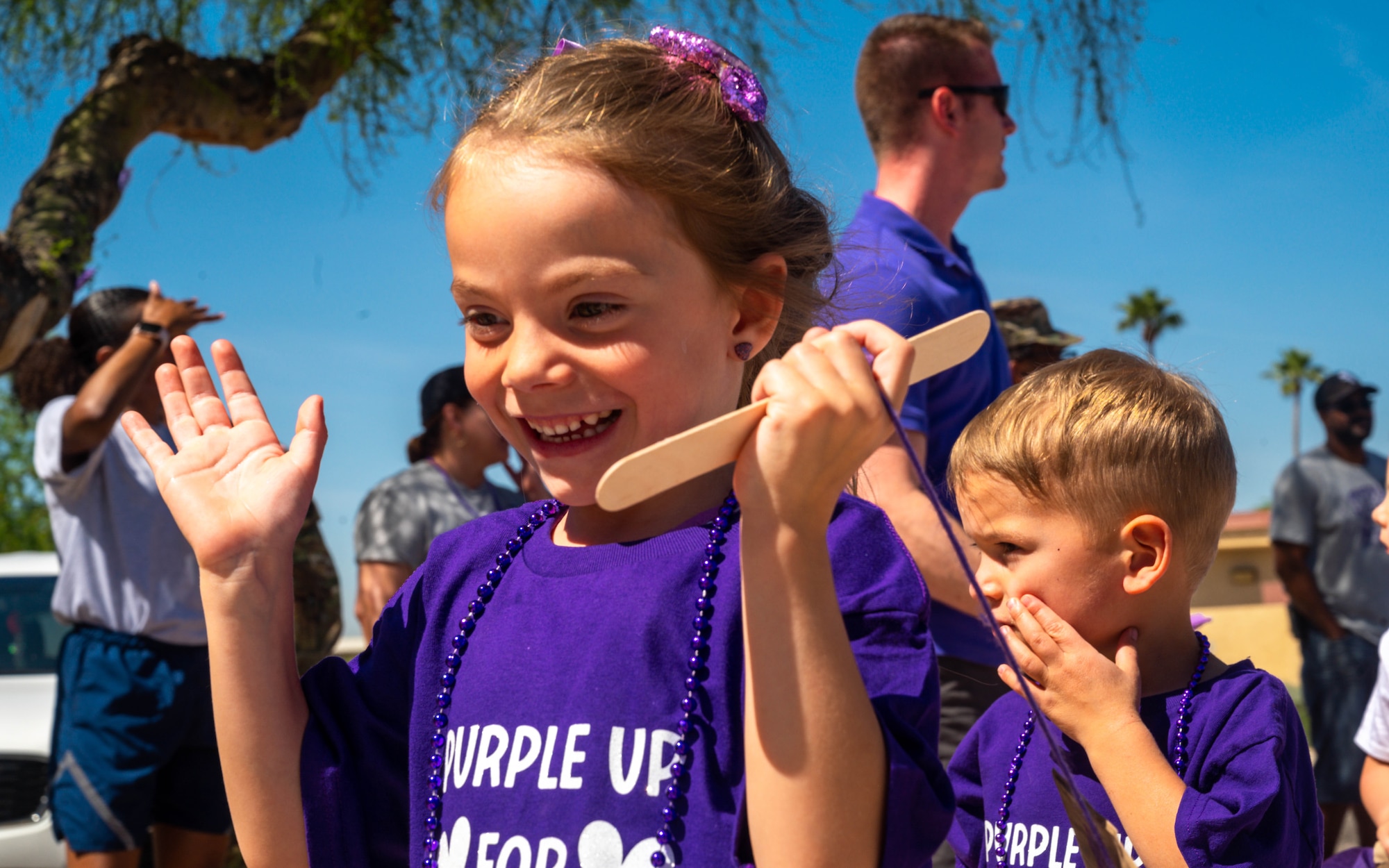 Children from the Luke Air Force Base Child Development Center participate in a parade, April 21, 2023, at Luke AFB, Arizona.