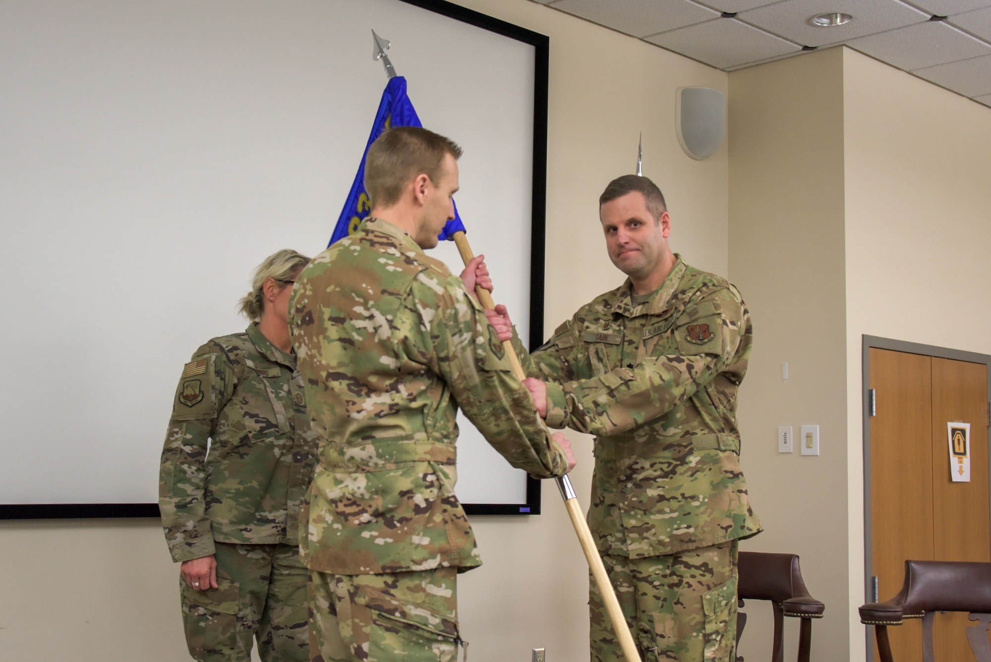 Photo of Lt Col Matthew Cain Assuming Command of the 183 Air Mobility Operations Squadron