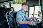 Sam Pruiett, operation manager, Shop 11/17, Shipfitters, Forge, Sheet metal, has been driving a Worker/Driver bus for the past 29 years. (U.S. Navy photo by Scott Hansen)