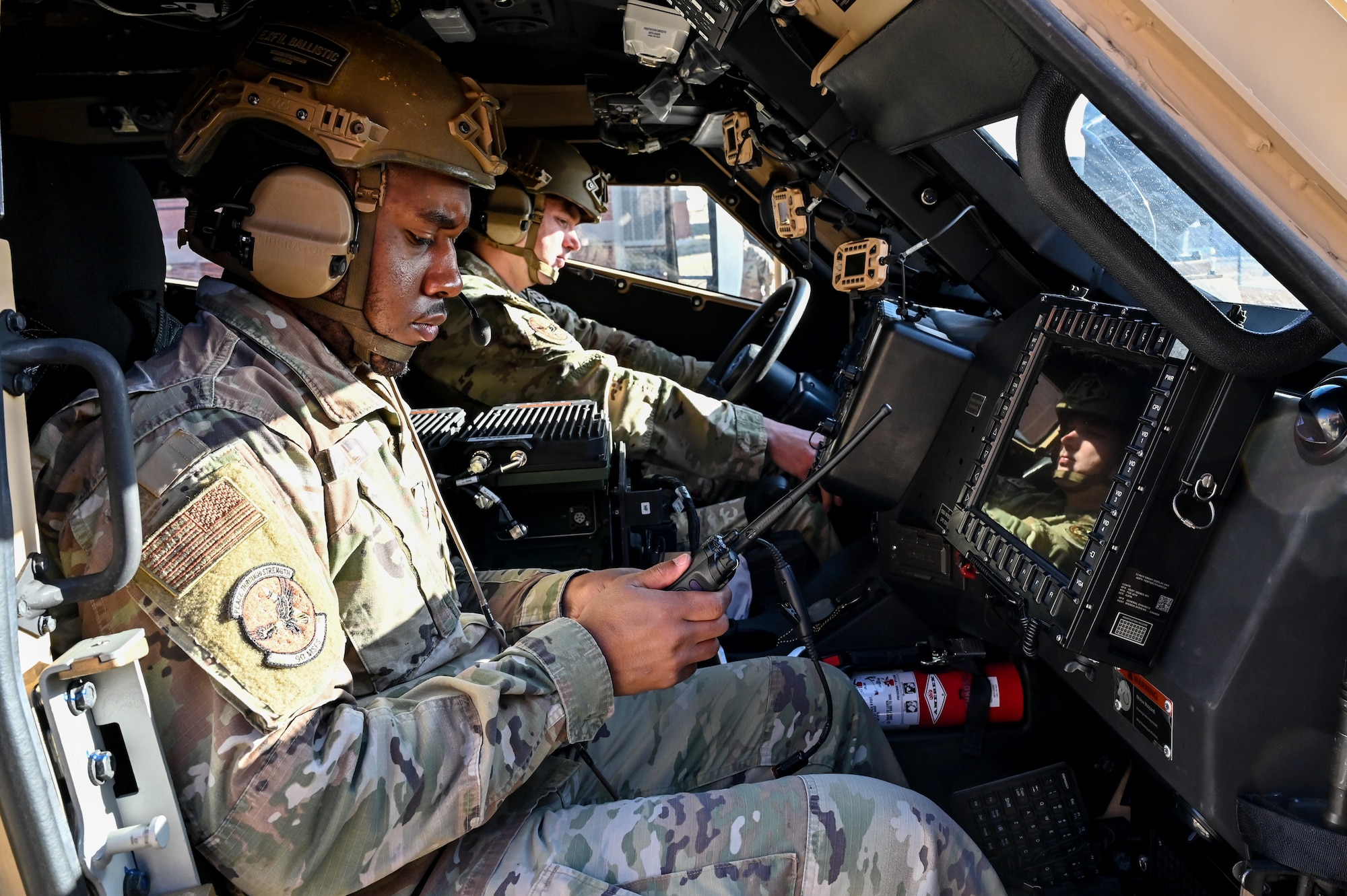 Airmen from the 90th Missile Security Forces Squadron conduct the first operational Joint Light Tactical Vehicle mission supporting maintenance at a launch facility near Harrisburg, Nebraska, April 24, 2023. This is the first step in modernizing the security forces vehicle fleet to provide more lethality and security for the nuclear enterprise. (Air Force photo by Joseph Coslett Jr.)