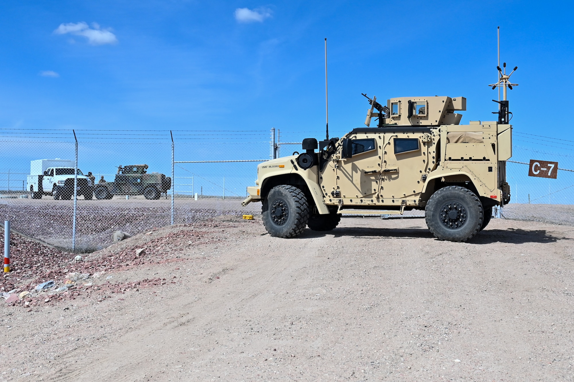 Airmen from the 90th Missile Security Forces Squadron conduct the first operational Joint Light Tactical Vehicle mission supporting maintenance at a launch facility near Harrisburg, Nebraska, April 24, 2023. This is the first step in modernizing the security forces vehicle fleet to provide more lethality and security for the nuclear enterprise. (Air Force photo by Joseph Coslett Jr.)