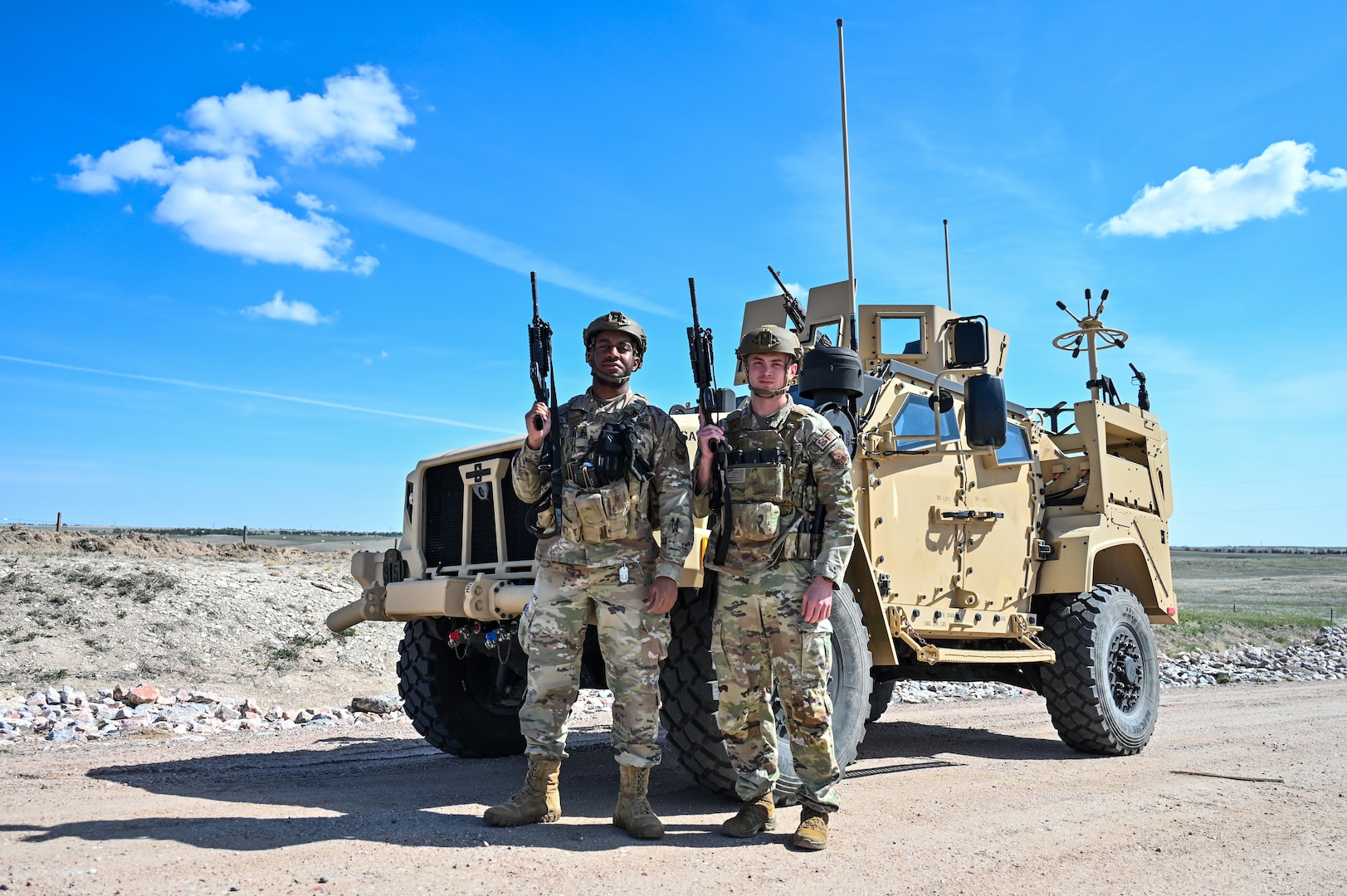 Airmen from the 90th Missile Security Forces Squadron conduct the first operational Joint Light Tactical Vehicle mission supporting maintenance at a launch facility near Harrisburg, Nebraska, April 24, 2023. This is the first step in modernizing the security forces vehicle fleet to provide more lethality and security for the nuclear enterprise. (Air Force photo by Joseph Coslett Jr.)