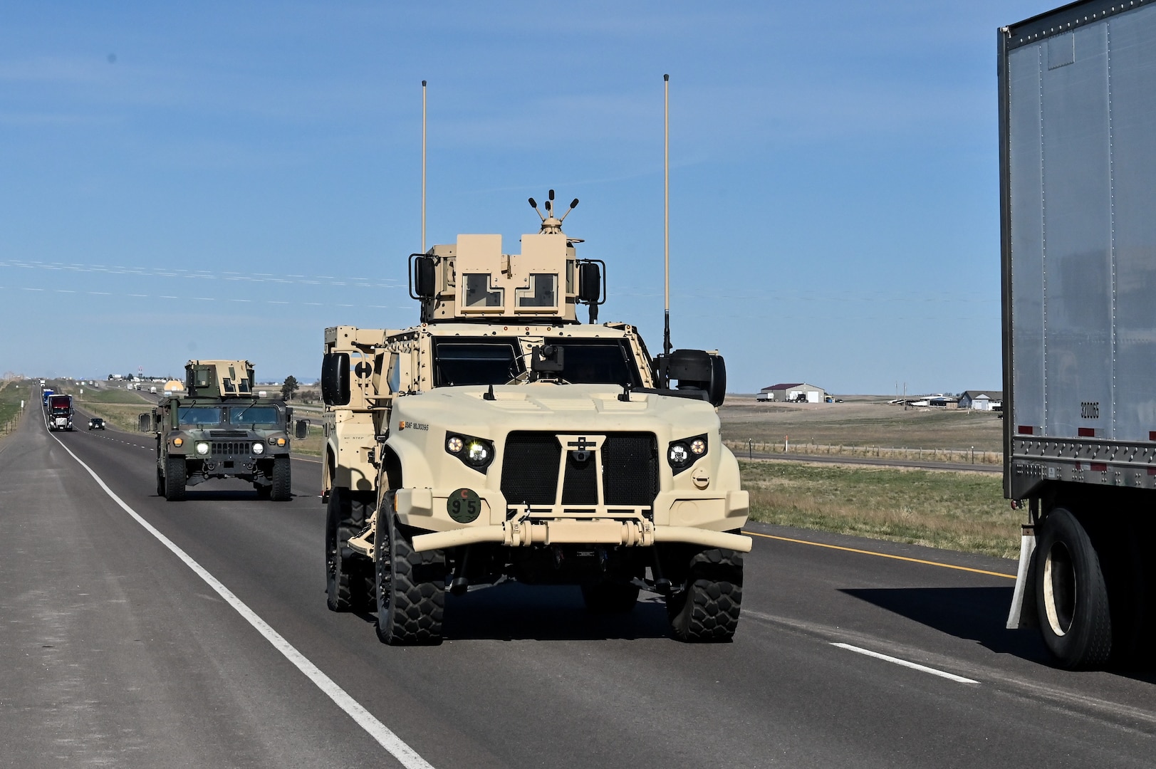 Airmen from the 90th Missile Security Forces Squadron conduct the first operational Joint Light Tactical Vehicle mission supporting maintenance at a launch facility near Harrisburg, Nebraska, April 24, 2023. This is the first step in modernizing the security forces vehicle fleet to provide more lethality and security for the nuclear enterprise. (Air Force photo by Joseph Coslett Jr.)