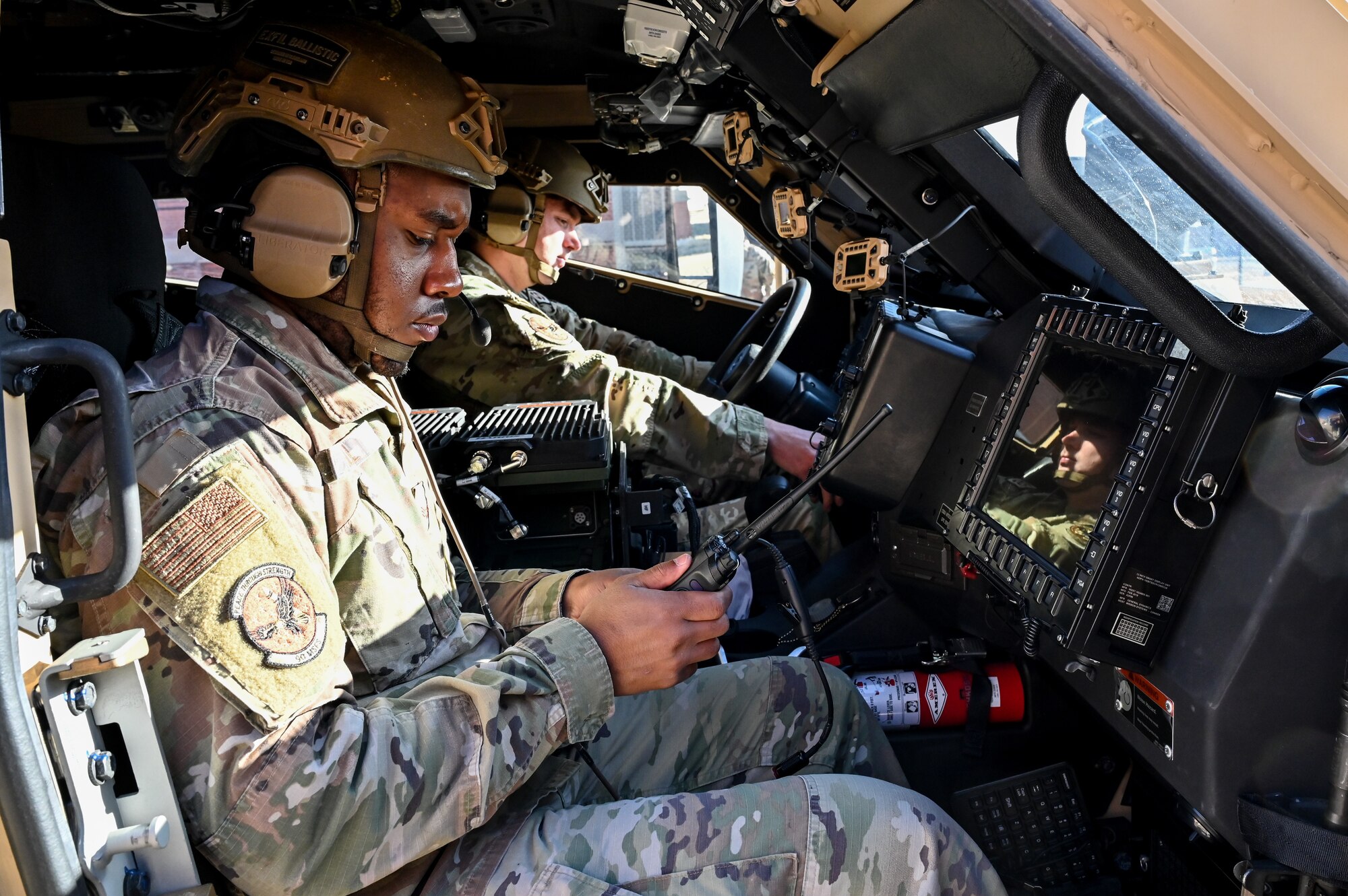 Airmen from the 90th Missile Security Forces Squadron conduct the first operational Joint Light Tactical Vehicle mission supporting maintenance at a launch facility near Harrisburg, Nebraska, April 24, 2023. This is the first step in modernizing the security forces vehicle fleet to provide more lethality and security for the nuclear enterprise. (Air Force photo by Joseph Coslett Jr.)