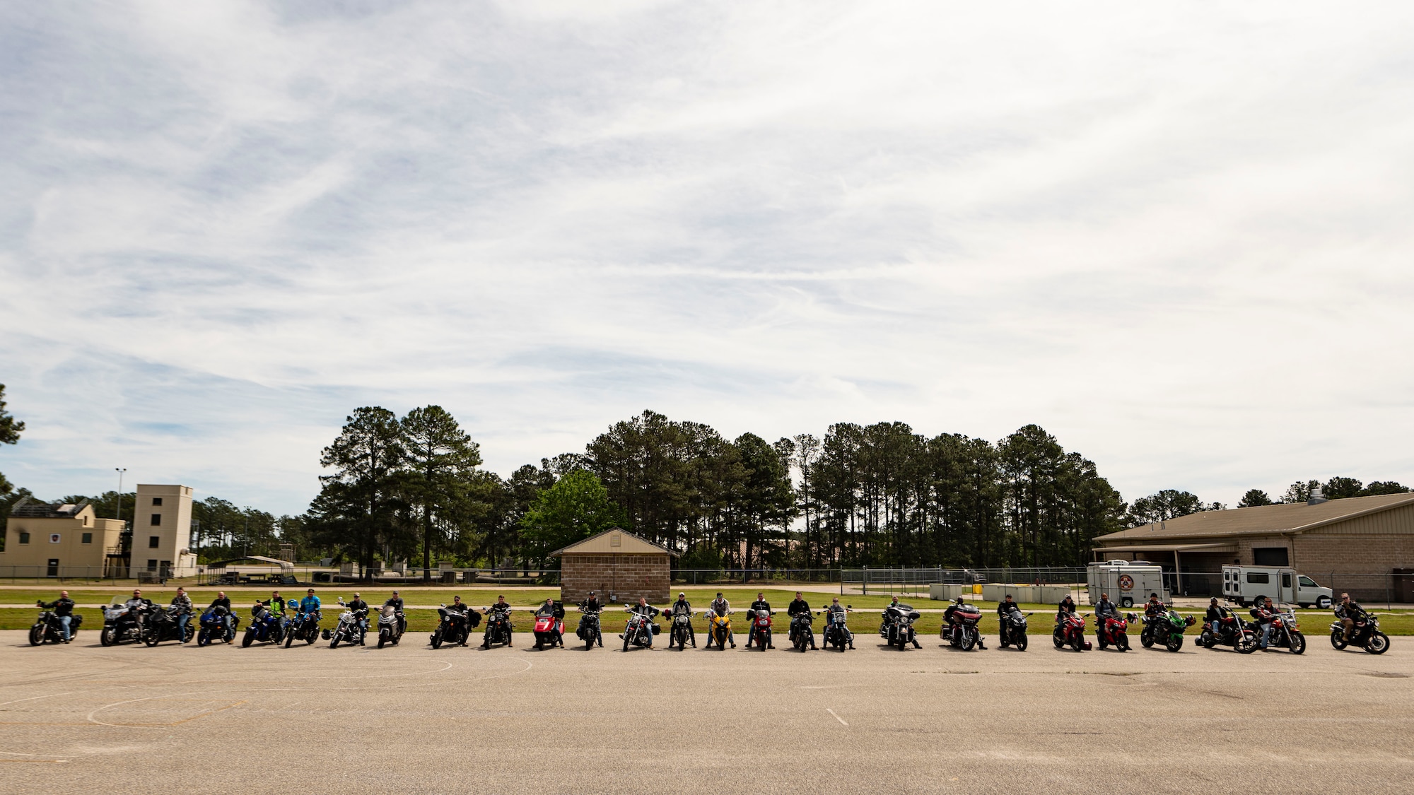 Bike riders pose for a photo.