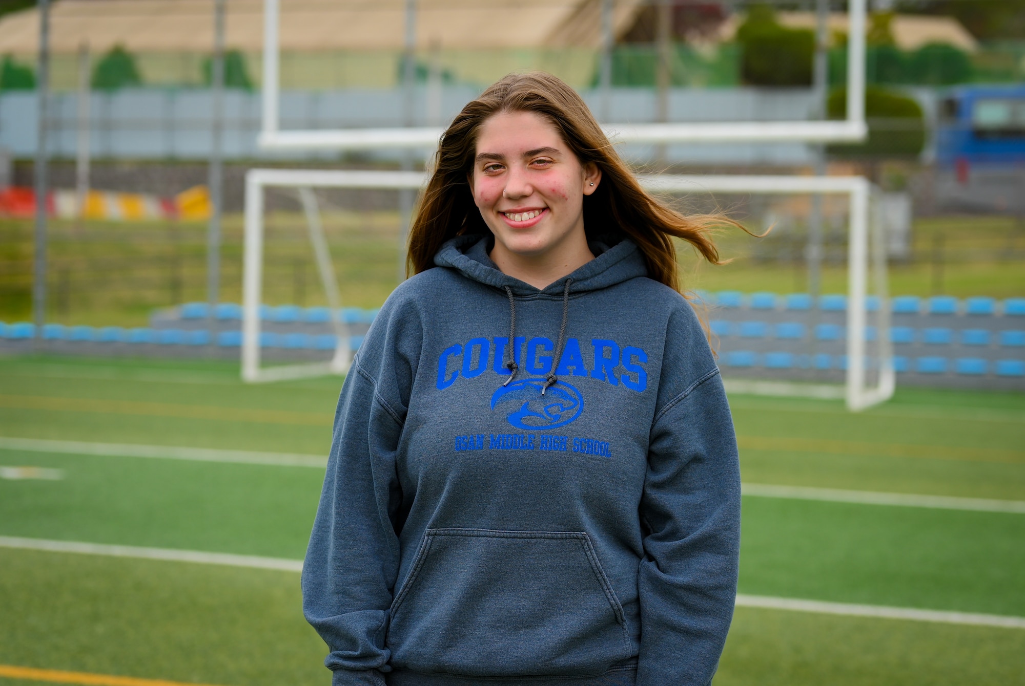 Military Youth of the Year for Asia, Bailee McCullom, poses for a portrait photo, at Osan Air Base, Republic of Korea, Apr. 21, 2023. McCullom was awarded the title for displaying leadership qualities through service to her community. (U.S. Air Force Photo by Staff Sgt. Kelsea J. Caballero)