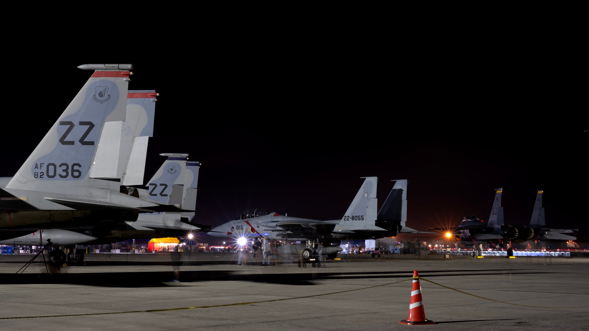 U.S. Air Force F-15C Eagles from the 44th and 67th Fighter Squadrons, a Japan Air Self Defense Force F-15DJ Eagle and a 336th Fighter Squadron F-15E Strike Eagle are on static display during America Fest 2023 at Kadena Air Base, Japan, April 23, 2023. Festival attendees were able to view and learn about a wide variety of U.S. and Japanese aircraft during the event. (U.S. Air Force photo by Senior Airman Jessi Roth)