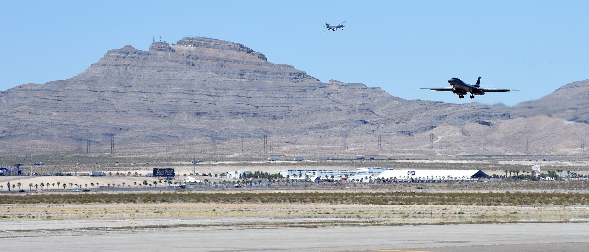 Two B-1B Lancers prepare to land at Nellis Air Force Base, Nev., June 14, 2017. The two test jets, assigned to the 337th Test and Evaluation Squadron, carry the new software for Sustainment Block 17. This was the first time SB17 was operationally tested.
