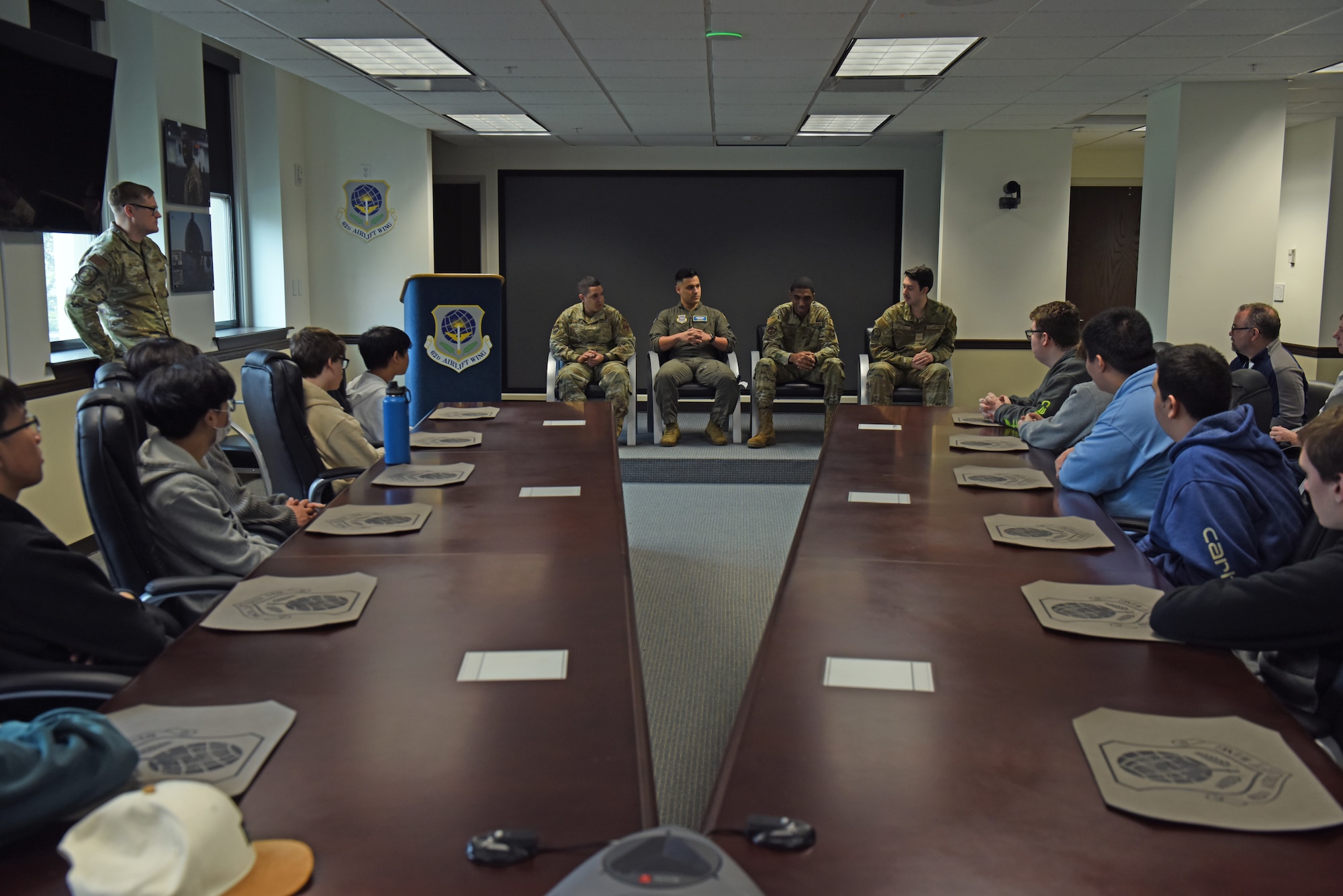 Airmen with the 62d Airlift Wing participate in a question-and-answer panel during a base tour for Olympia High School students at Joint Base Lewis-McChord, Washington, April 21, 2023. In addition to the panel, students also visited a C-17 Globemaster III simulator, received a mission briefing from Wing leadership and visited Heritage Hill to see historic aircraft and learn about Team McChord’s mission. (U.S. Air Force photo by Staff Sgt. Zoe Thacker)