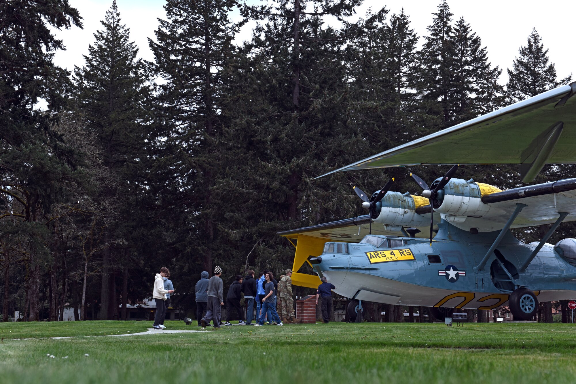 Olympia High School students visit Heritage Hill during a base tour at Joint Base Lewis-McChord, Washington, April 21, 2023. In addition to the airpark tour, students from Olympia High School also visited the C-17 Globemaster III simulator, received a mission briefing from Wing leadership and participated in an officer and enlisted Airmen question-and-answer panel to learn more about the Air Force. (U.S. Air Force photo by Staff Sgt. Zoe Thacker)