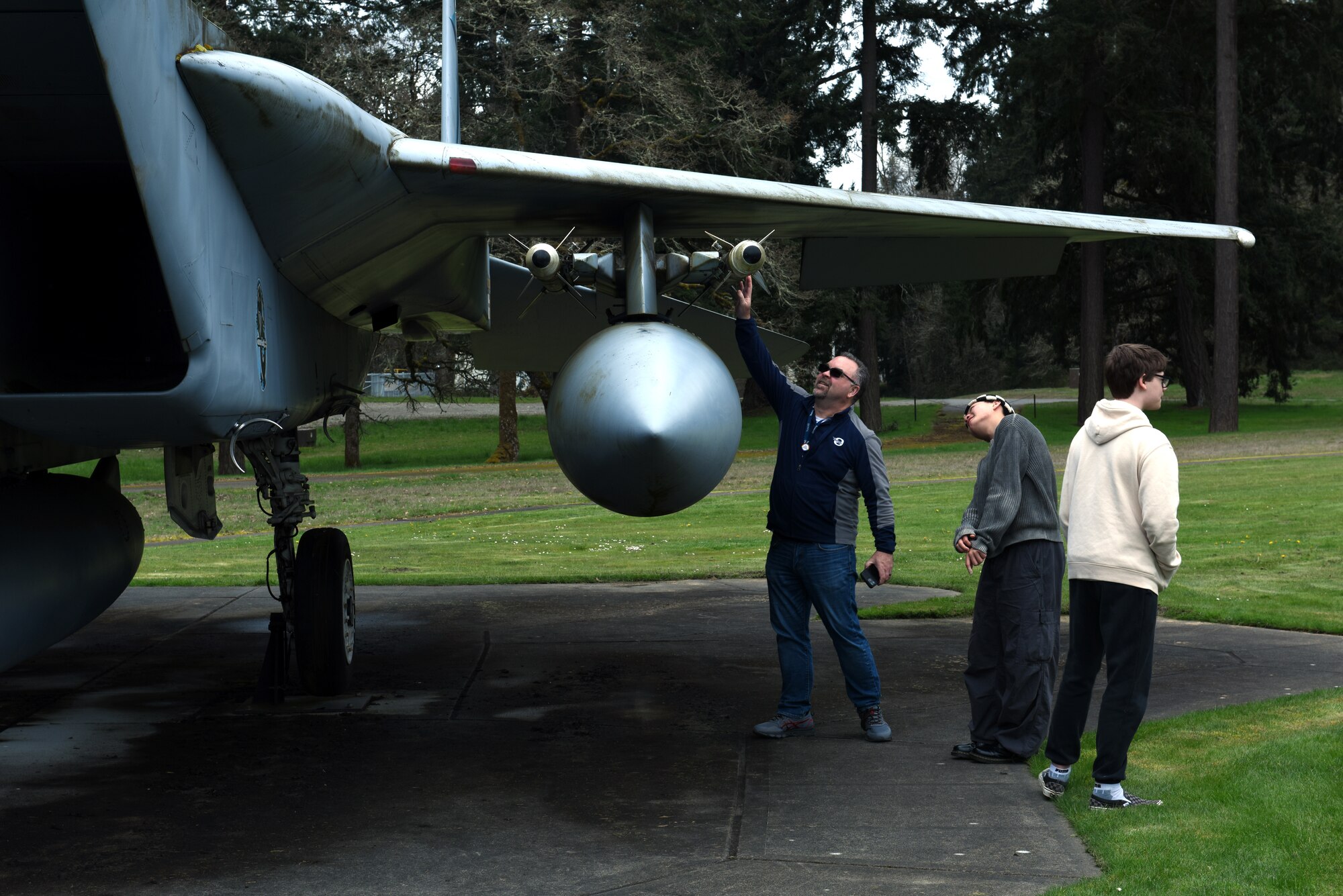Olympia High School students and staff visit Heritage Hill during a base tour at Joint Base Lewis-McChord, Washington, April 21, 2023. In addition to the airpark tour, students from Olympia High School also visited the C-17 Globemaster III simulator, received a mission briefing from Wing leadership and participated in an officer and enlisted Airmen question-and-answer panel to learn more about the Air Force. (U.S. Air Force photo by Staff Sgt. Zoe Thacker)