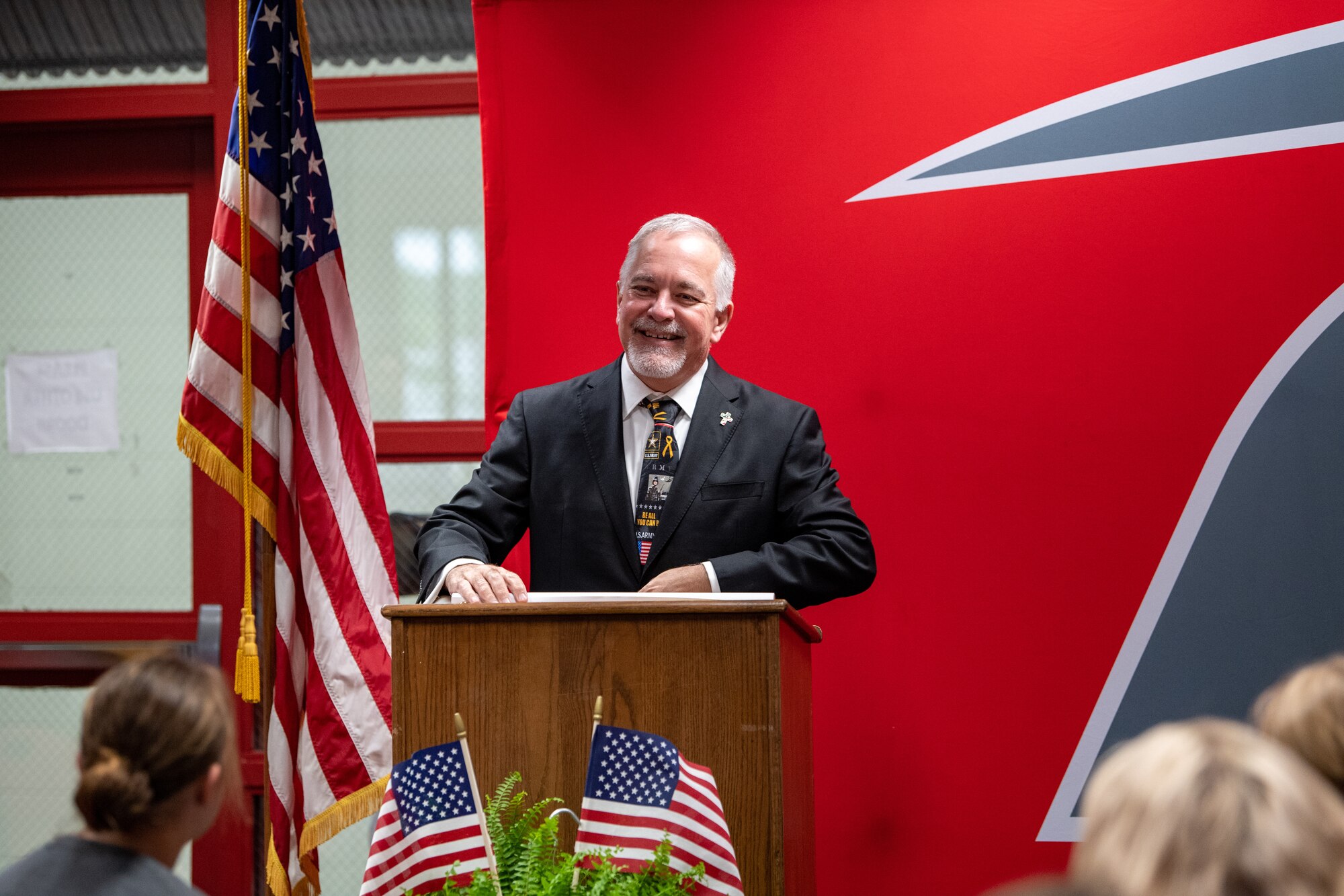 Richard Wood, Georgia Department of Education superintendent of schools, speaks to Berrien Middle School students and faculty during a Military Flagship School Award ceremony in Nashville, Georgia, April 24, 2023. Each year the Georgia Department of Education selects eight schools across the state to present the Military Flagship School Award to schools that go above and beyond to take care of their military affiliated students. (U.S. Air Force photo by Senior Airman Courtney Sebastianelli)