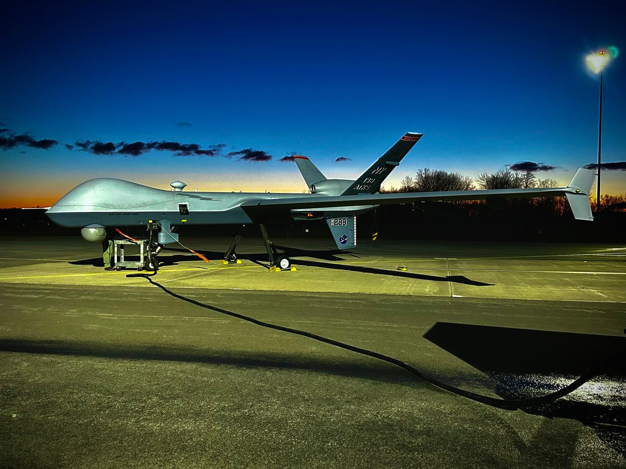 An MQ-9 assigned to the 174th Attack Wing, Hancock Air National Guard Base sits on the runway. The 174th Attack Wing’s MQ-9 Reaper remotely piloted aircraft recently had its satellite communication system upgraded. This system will allow the transmission of higher-quality voice, data, and video transmissions. (U.S. Air National Guard photo by Lt. Col. Lee Nietzel)