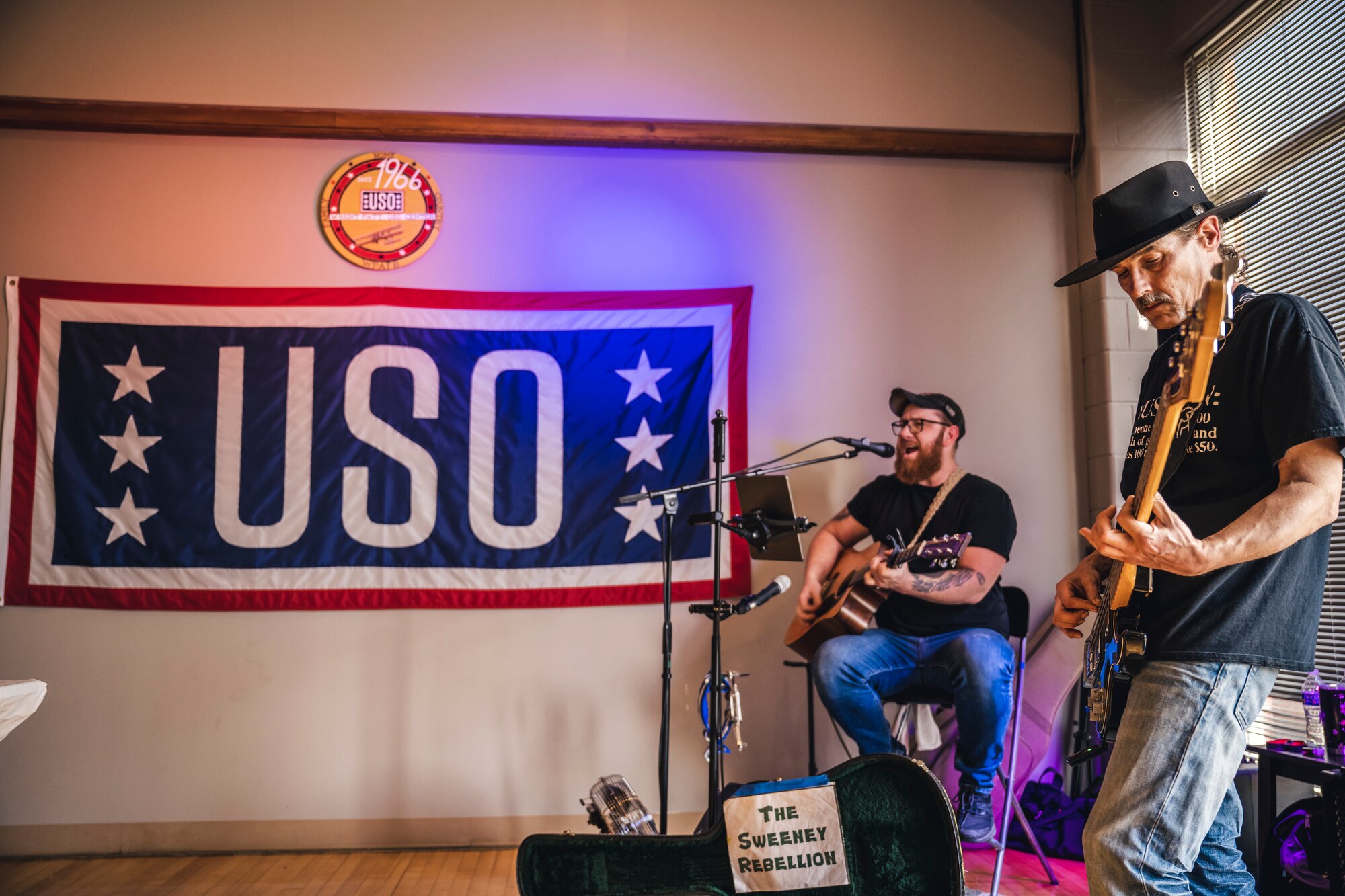 Shawn Sweeney and Kjell Ogden of The Sweeney Rebellion band perform during the annual USO volunteer appreciation dinner at Wright-Patterson Air Force Base, Ohio, April 20.