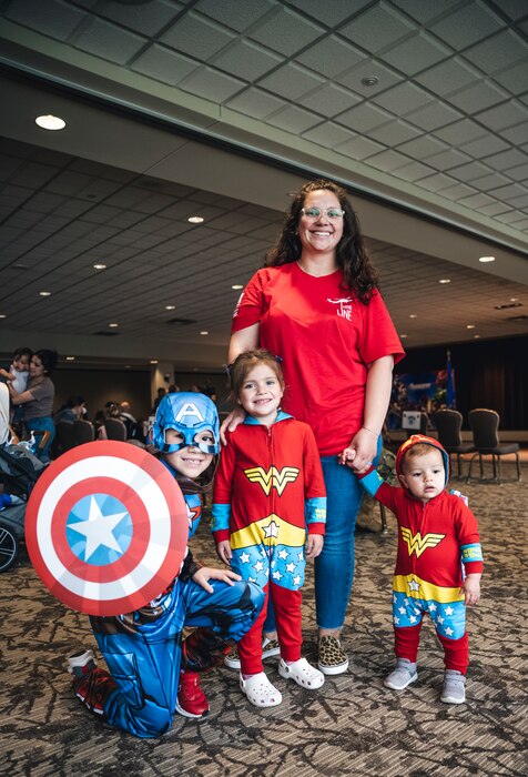 Military spouse Rabekka Orozco poses with her “little heroes” (from left) Jacob, 7, Emmy, 4, and 1-year-old Olivia during the Little Heroes ceremony April 21 at the Wright-Patt Club on Wright-Patterson Air Force Base, Ohio.