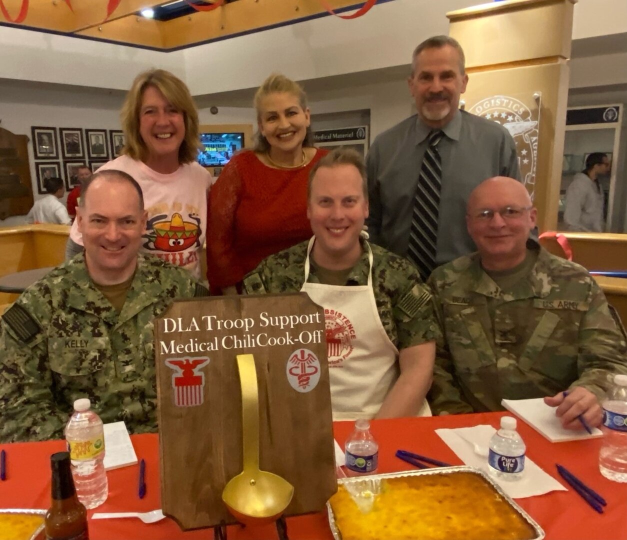 DLA Troop Support leadership poses with the trophy for the Medical Culture Improvement Team chili cook-off held March 29 in Philadelphia. (Photo by Alison Welski, DLA)