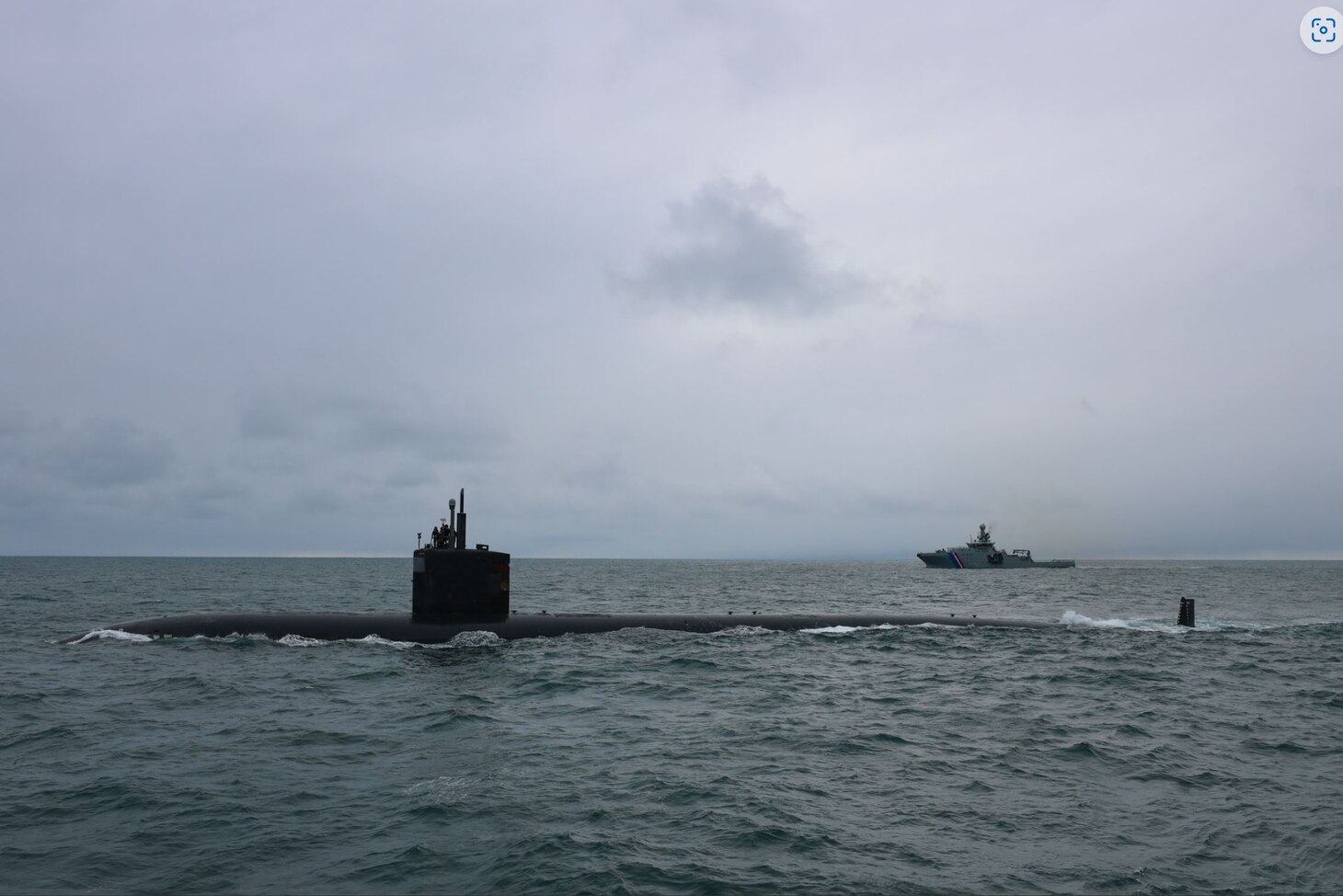 USS San Juan (SSN 751) conducts a brief stop for supplies and personnel off the coast of Iceland, supported by Icelandic Coast Guard ICVG Þór, April 26, 2023.