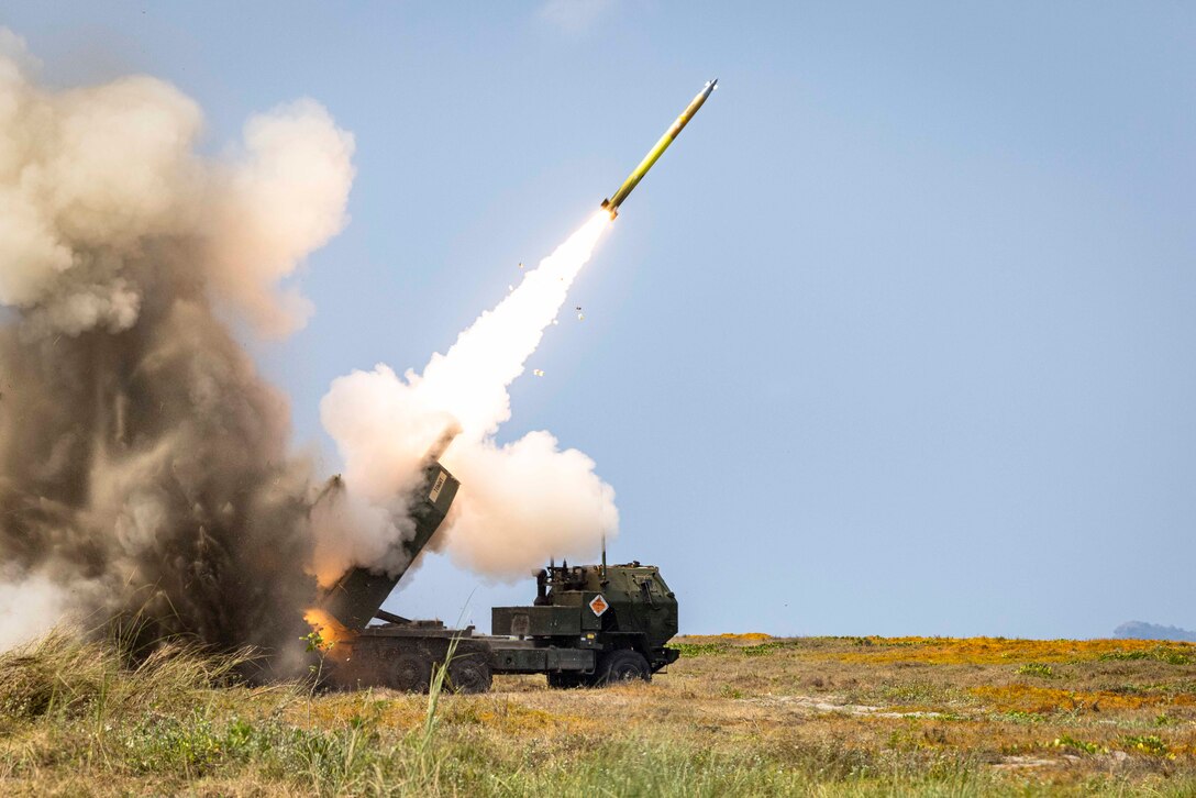 A U.S. Army High Mobility Artillery Rocket System fires during a littoral live fire event during Balikatan 23 at the Naval Education, Training and Doctrine Command, Philippines, April 26, 2023. Balikatan 2023 is the 38th iteration of the annual bilateral exercise between the Armed Forces of the Philippines and the U.S. military. The exercise includes three weeks of training focused on amphibious operations, command and control, humanitarian assistance, urban operations and counterterrorism skills throughout northern and western Luzon. Coastal defense training figures prominently in the Balikatan 23 training schedule. (U.S. Marine Corps photo by Sgt. Samuel Fletcher)