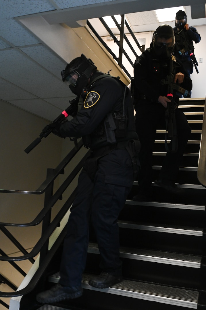 Personnel from the City of Ketchikan Police Department conducts a full-sale active shooter exercise aboard the Ketchikan Alaska Marine Highway System marine vessel Matanuska in Ketchikan, Alaska, April 26, 2023. The exercise is designed to improve active shooter response protocols and interagency coordination for potential emergencies. U.S. Coast Guard photo by Petty Officer Third Class Ian Gray.