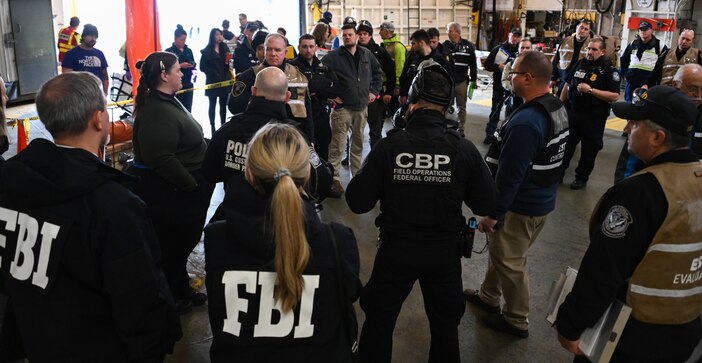 Personnel from Coast Guard Sector Juneau, Coast Guard Station Ketchikan, Coast Guard Public Information Assist Team City of Ketchikan Police, Fire, and EMS, Federal Bureau of Investigation, Alaska State Troopers, Alaska Wildlife Troopers, Alaska Marine Highway System, North and South Tongass Fire Department, PeaceHealth Medical Center, City of Ketchikan Docks and Harbors, U.S. Customs and Border Protection, U.S. Forest Service, NOAA - Office of Law Enforcement and Alaska Division of Homeland Security and Emergency Management conducts a debrief following a full-scale active shooter exercise aboard the Ketchikan Alaska Marine Highway System marine vessel Matanuska in Ketchikan, Alaska, April 26, 2023. The exercise is designed to improve active shooter response protocols and interagency coordination for potential emergencies. U.S. Coast Guard photo by Petty Officer Third Class Ian Gray.