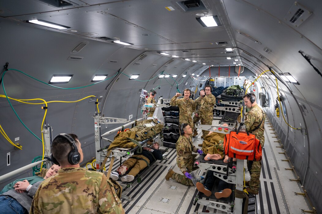 Image of Airmen training on an aircraft.