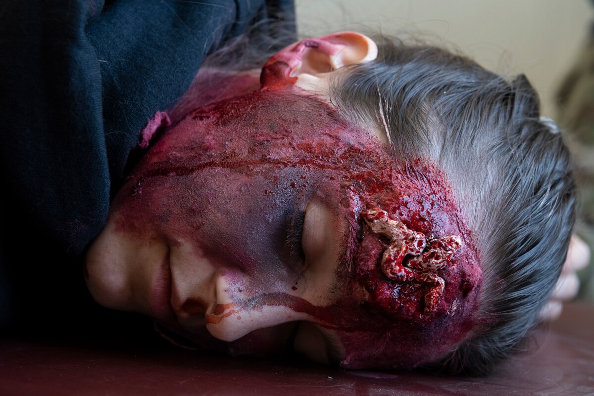 Image of an Airman with fake makeup.