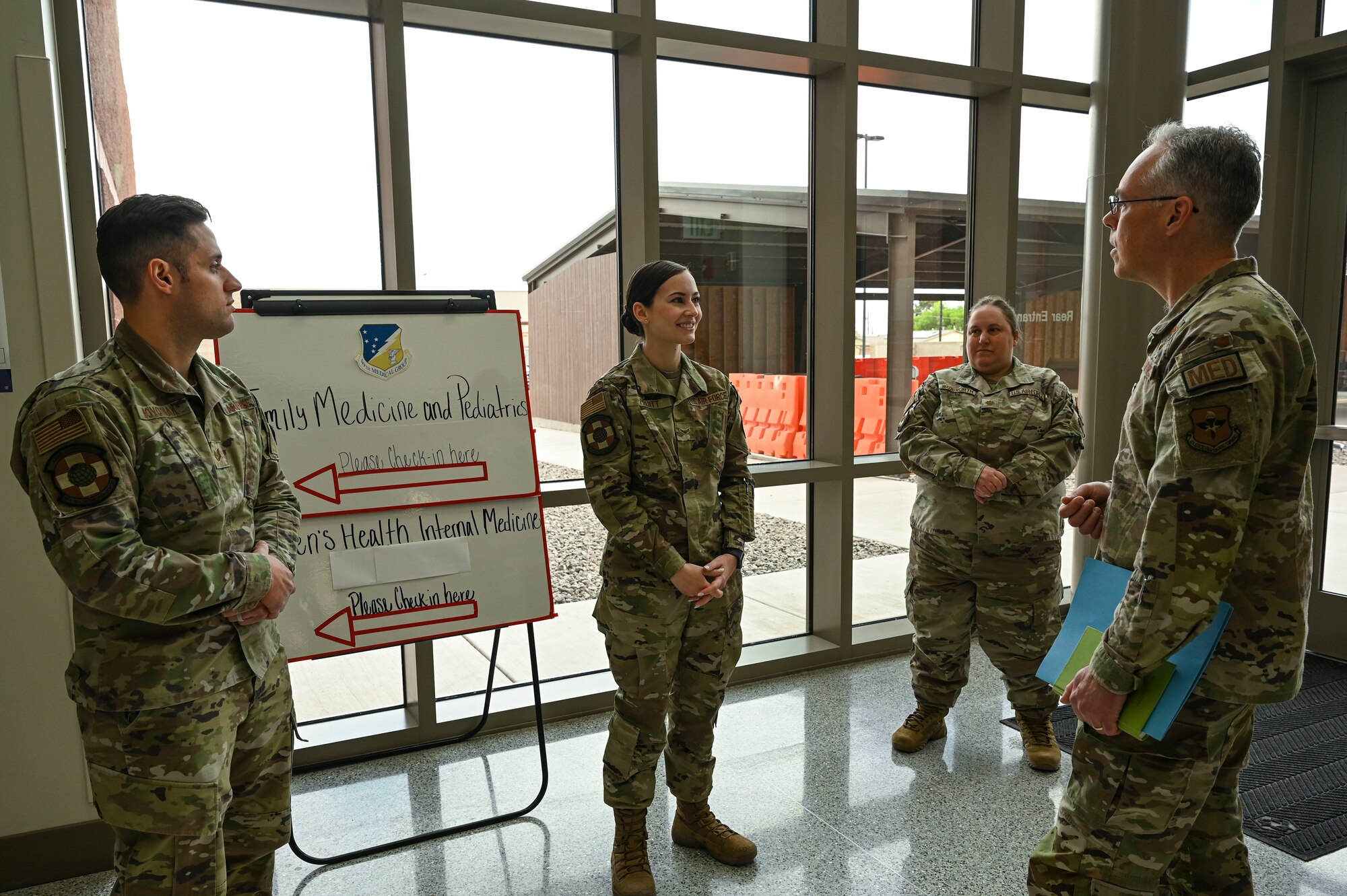 U.S. Air Force Col. Christopher Grussendorf, Air Education and Training Command surgeon general, right, tours the 49th Medical Group Family Health Clinic, Pediatrics and Women’s Health at Holloman Air Force Base, New Mexico, April 13, 2023. The 49th MDG provides quality care to over 14,000 beneficiaries in the surrounding area provided by a team of both civilians and service members employed at the clinic. (U.S. Air Force photo by Airman 1st Class Isaiah Pedrazzini)