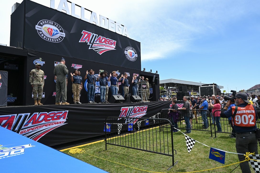 Lt. Gen. John P. Healy, chief of Air Force Reserve and commander, Air Force Reserve Command, administers the Oath of Enlistment to members of the delayed entry program