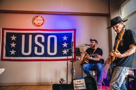 Shawn Sweeney and Kjell Ogden of The Sweeney Rebellion band perform during the annual USO volunteer appreciation dinner at Wright-Patterson Air Force Base, Ohio, April 20.