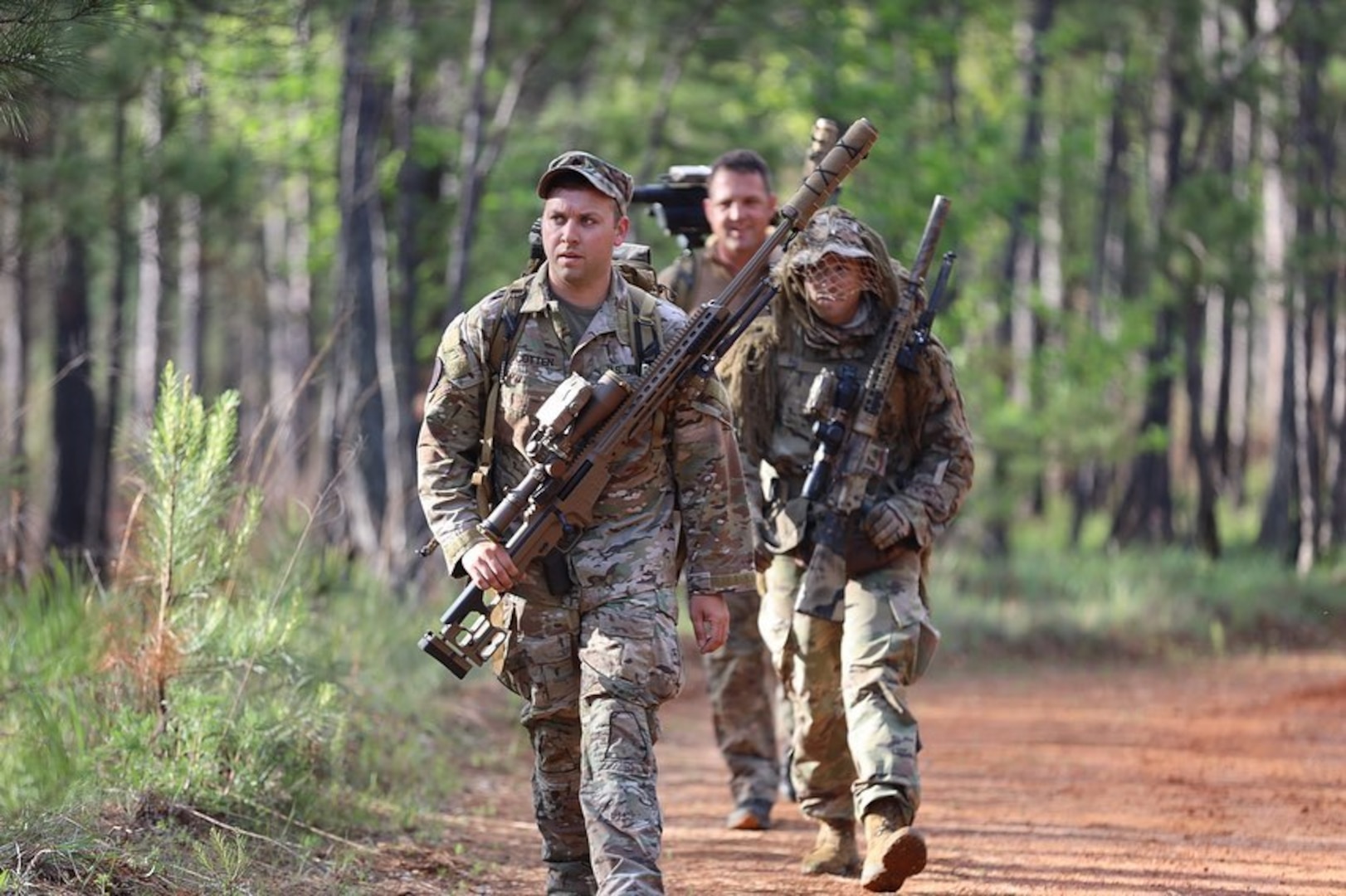 Team Leader Sgt. 1st Class Erik Vargas of the New Mexico National Guard, and teammates Staff Sgt. Benjamin Cotten and Staff Sgt. Allen Smith of the Arkansas National Guard during the International Sniper Competition at Fort Benning, Ga., April 8-13, 2023. The team placed first.