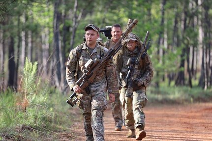 Team Leader Sgt. 1st Class Erik Vargas of the New Mexico National Guard, and teammates Staff Sgt. Benjamin Cotten and Staff Sgt. Allen Smith of the Arkansas National Guard during the International Sniper Competition at Fort Benning, Ga., April 8-13, 2023. The team placed first.