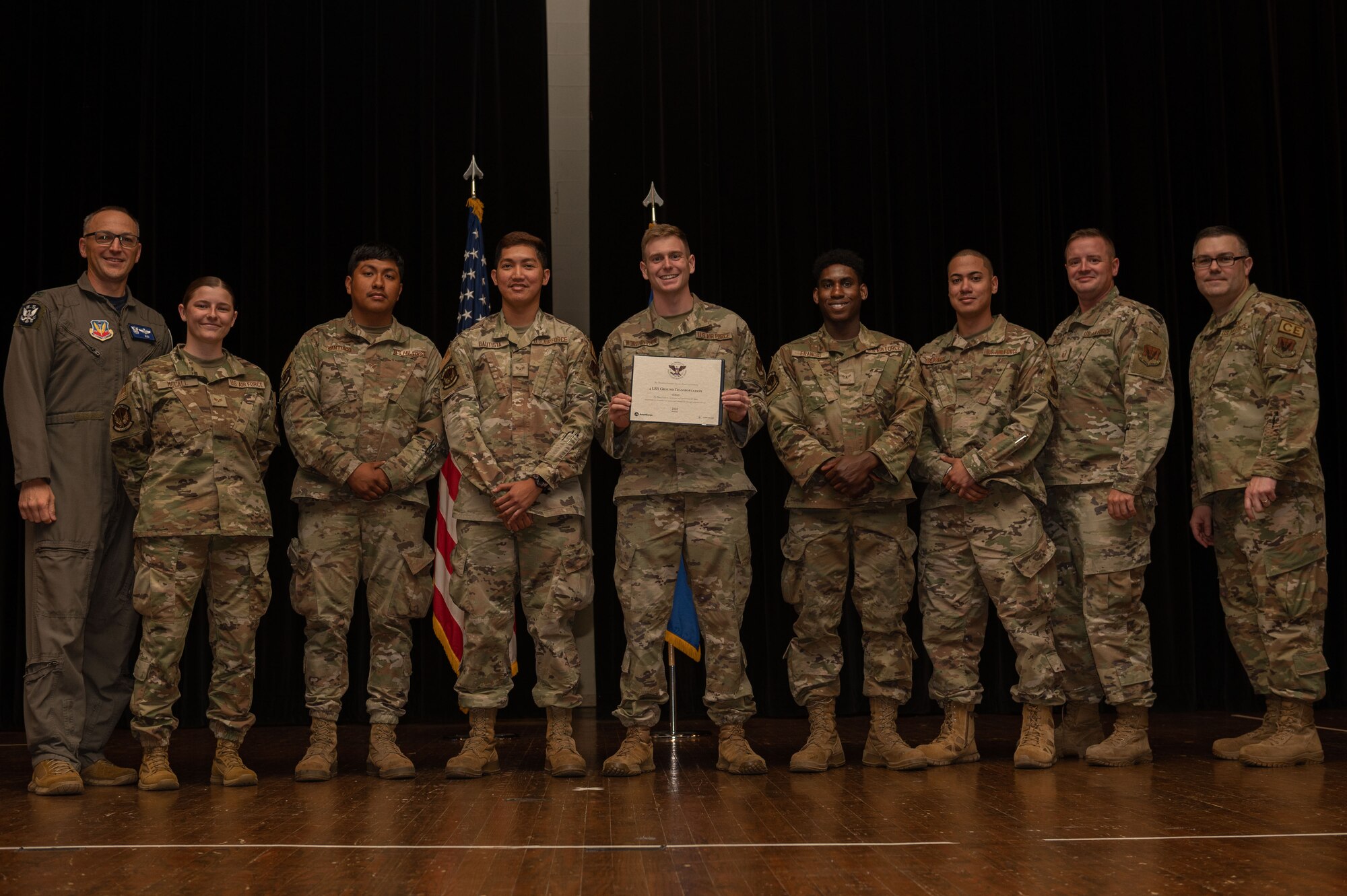 Col. Steven Bofferding, left, 4th Fighter Wing vice commander, and Chief Master Sgt. Kyle O’Hara, right, 4th Civil Engineer Squadron command chief, present the Gold Presidential Volunteer Service Award to a Seymour Johnson Air Force Base volunteers during a volunteer appreciation ceremony at Seymour Johnson Air Force Base, North Carolina, April 21, 2023. The Gold award winners have completed 250 or more hours for young adults, 500 or more hours for adults and 1000 or more hours for families and groups. (U.S. Air Force photo by Airman 1st Class Rebecca Sirimarco-Lang)