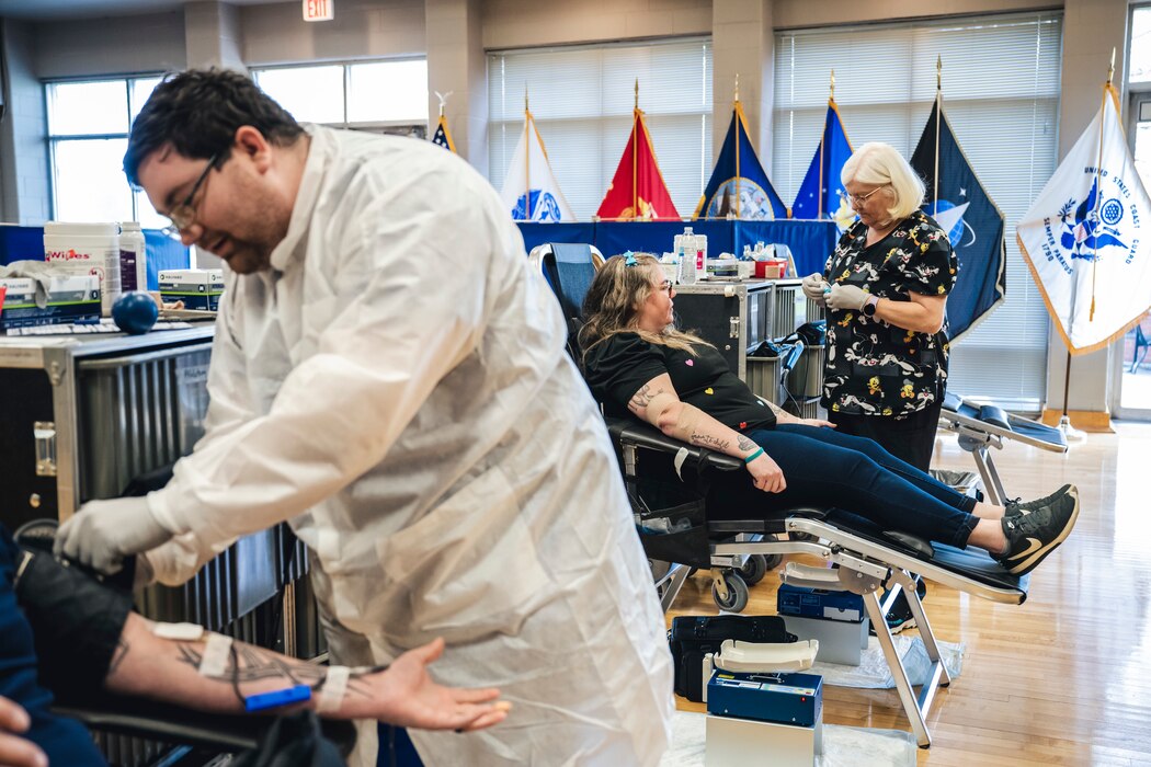 Jamie Rowe, Sexual Assault Prevention and Response victim advocate, donates blood April 25 during the USO’s blood drive event at Wright-Patterson Air Force Base, Ohio.