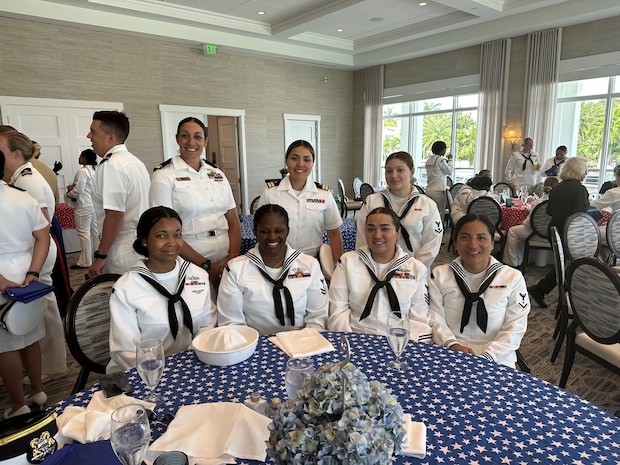 230426-N-ZK609-0004 Fort Lauderdale, Fla. (April 26, 2023). Members of the USS Cole (DDG-67) pose for a picture during the Salute to Women in the Military luncheon during Fleet Week Port Everglades. This luncheon has been an annual event on the Fleet Week Port Everglades schedule since 2017. (Photo by Navy Region Southeast Public Affairs Specialist Twilla Burns/released).