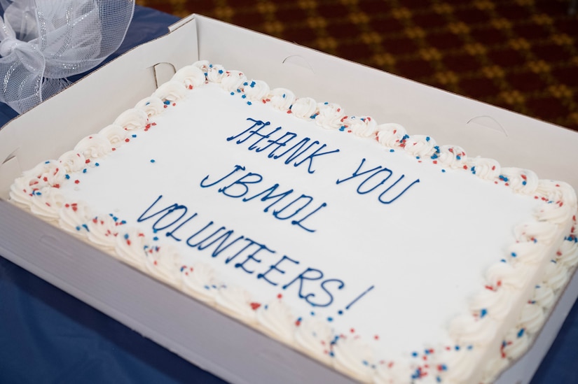 A celebratory cake was cut in honor of the volunteer appreciation ceremony April 25, 2023 on Joint Base McGuire Dix Lakehurst. The event was hosted by military family readiness to recognize the excellent volunteering efforts in support of JB MDL.(U.S. Air Force photo by Senior Airman Faith Iris MacIlvaine)