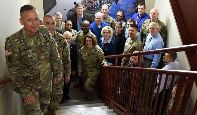 Lt. Gen. Daniel L. Karbler, commanding general of U.S. Army Space and Missile Defense Command, leads his USASMDC team up Stairwell B at the command’s Redstone Arsenal, Alabama, headquarters. With a “People First” leadership philosophy, SMDC ties with U.S. Army Special Operations Command for first place ranking of the Best Places to Work in the Army in 2022. (U.S. Army photo by Jason Cutshaw)