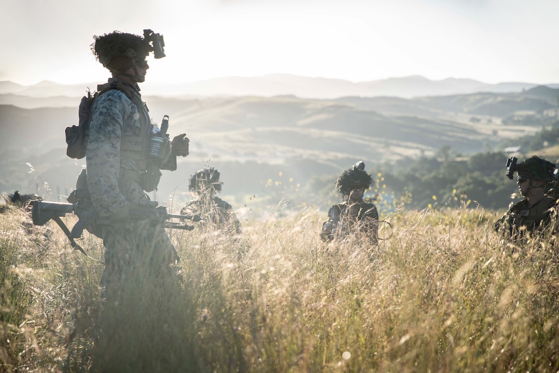U.S. Marines with Apache Company, 1st Battalion, 5th Marine Regiment, 1st Marine Division, conduct a patrol during a simulated raid at 1/5’s MCCRE on Marine Corps Base Camp Pendleton, April 20, 2023. The purpose of a MCCRE, is to formally evaluate the unit’s core and/or assigned mission essential tasks to ensure service standardization and combat readiness. (U.S. Marine Corps photo by Cpl. Patrick Katz)
