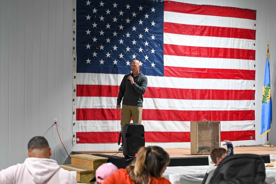 U.S. Air Force Col. Blaine Baker, 97th Air Mobility Wing commander, makes a speech during a Committee of 100 event at the Jackson County Expo Center in Altus, Oklahoma, April 24, 2023.The Altus Chamber of Commerce’s Committee of 100 hosts multiple events throughout the year to support Altus Air Force Base and the community by welcoming new Airmen to “mobility’s hometown.” (U.S. Air Force photo by Airman 1st Class Heidi Bucins)