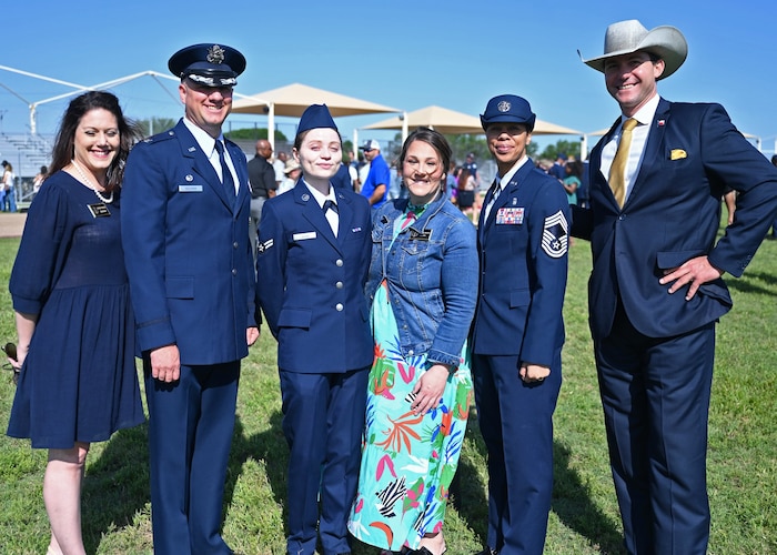 U.S. Air Force Col. Matthew Reilman, 17th Training Wing commander, and Goodfellow Honorary Commanders pose with Airman 1st Class Natalia Laziuk, Basic Military Training graduate, at Joint Base San Antonio-Lackland, Texas, April 27, 2023. Honorary commanders are hand selected to participate in base events and experience what it’s like to be part of the world’s greatest Air Force. (U.S. Air Force photo by Senior Airman Sarah Williams)