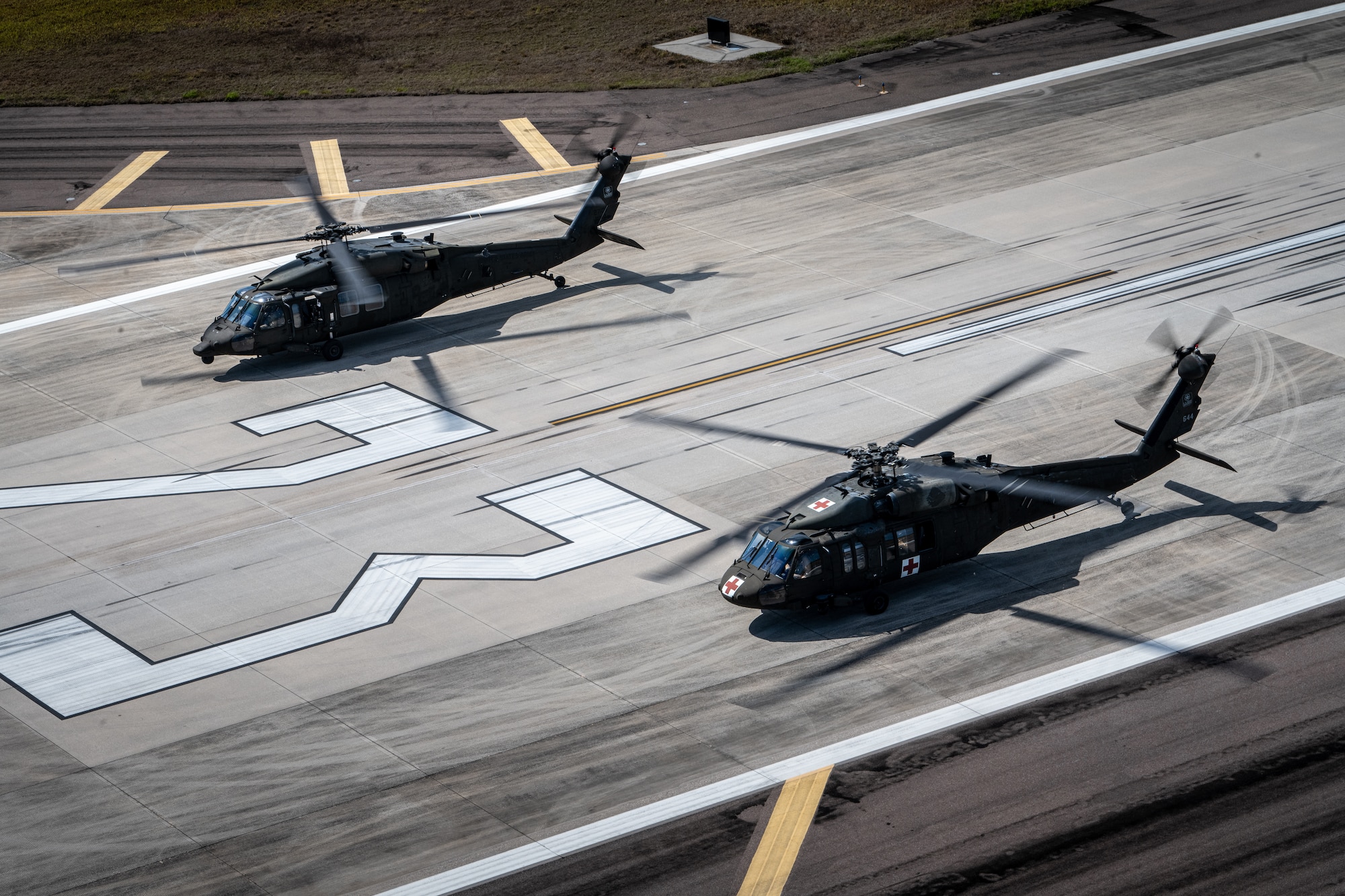 Two U.S. Army UH-60 Black Hawks assigned to the 5th Battalion, 159th Aviation Regiment participate in Operation Violent Storm at MacDill Air Force Base, Fla., April 26, 2023.