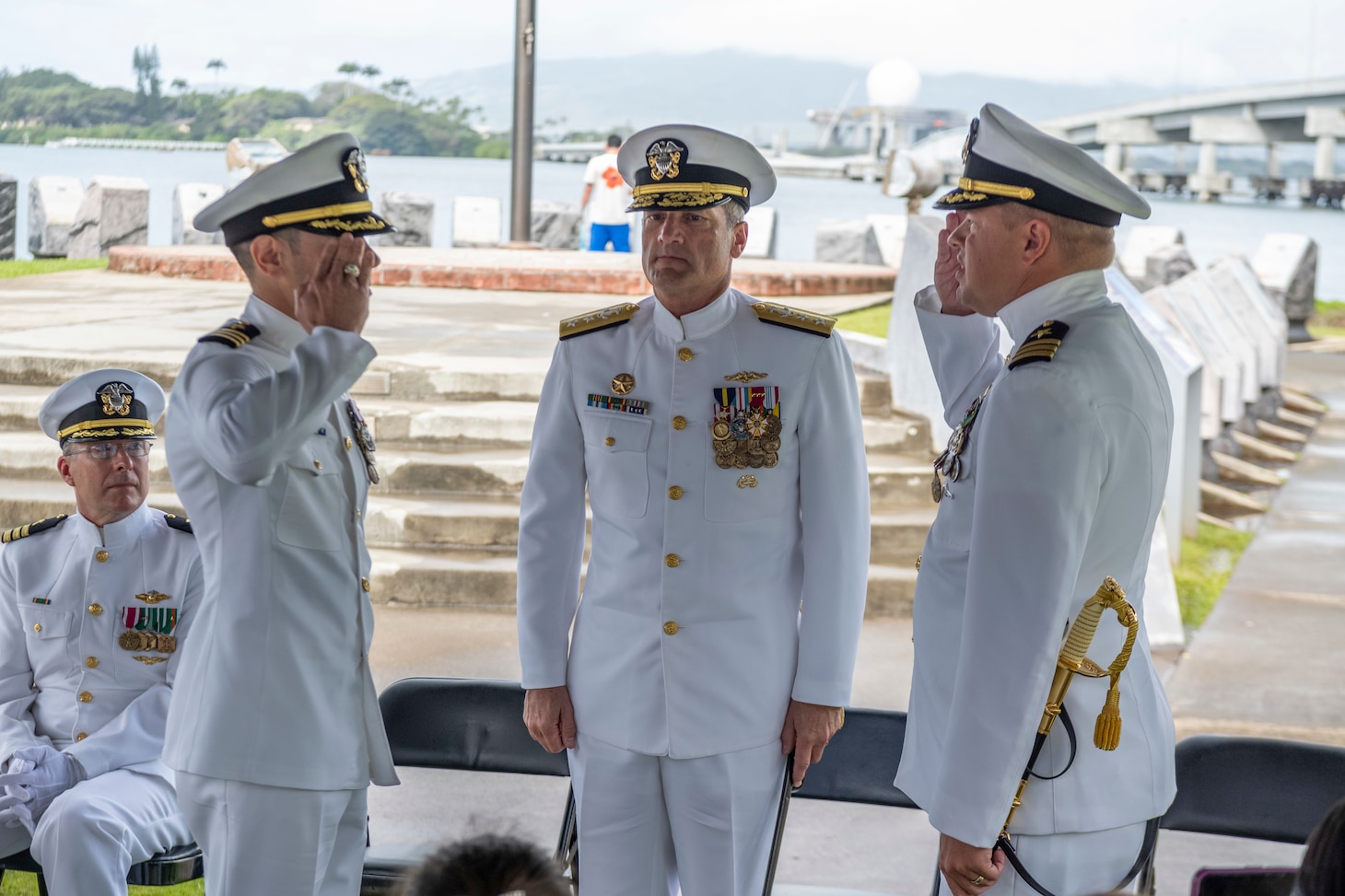230303-N-EI510-0125 PEARL HARBOR, Hawaii (March 3, 2023) Cmdr. Andrew Lichtenstein, prospective commanding officer of Submarine Readiness Squadron 33 (SRS-33), left, relieves Cmdr. Robert Walls, commanding officer of SRS-33, as commanding officer during a change of command ceremony at the Pacific Fleet Submarine Museum, March 3, 2023.  Submarine Readiness Squadron 33 provides operational support for Pearl Harbor homeported submarines, their crews, families, and the staffs of Submarine Squadrons 1 and 7. (U.S. Navy photo by Mass Communication Specialist 1st Class Scott Barnes)