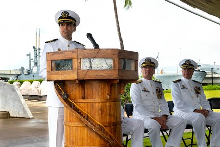 230303-N-NO841-0157 PEARL HARBOR, Hawaii (March 3, 2023) Cmdr. Andrew Lichtenstein, incoming commanding officer, Submarine Readiness Squadron 33, speaks during the change of command ceremony for Submarine Readiness Squadron 33 at the Pacific Fleet Submarine Museum, March 3, 2023.  Submarine Readiness Squadron 33 provides operational support for Pearl Harbor homeported submarines, their crews, families, and the staffs of Submarine Squadrons 1 and 7. (U.S. Navy photo by Torpedoman 3rd Class Tommy Heng)