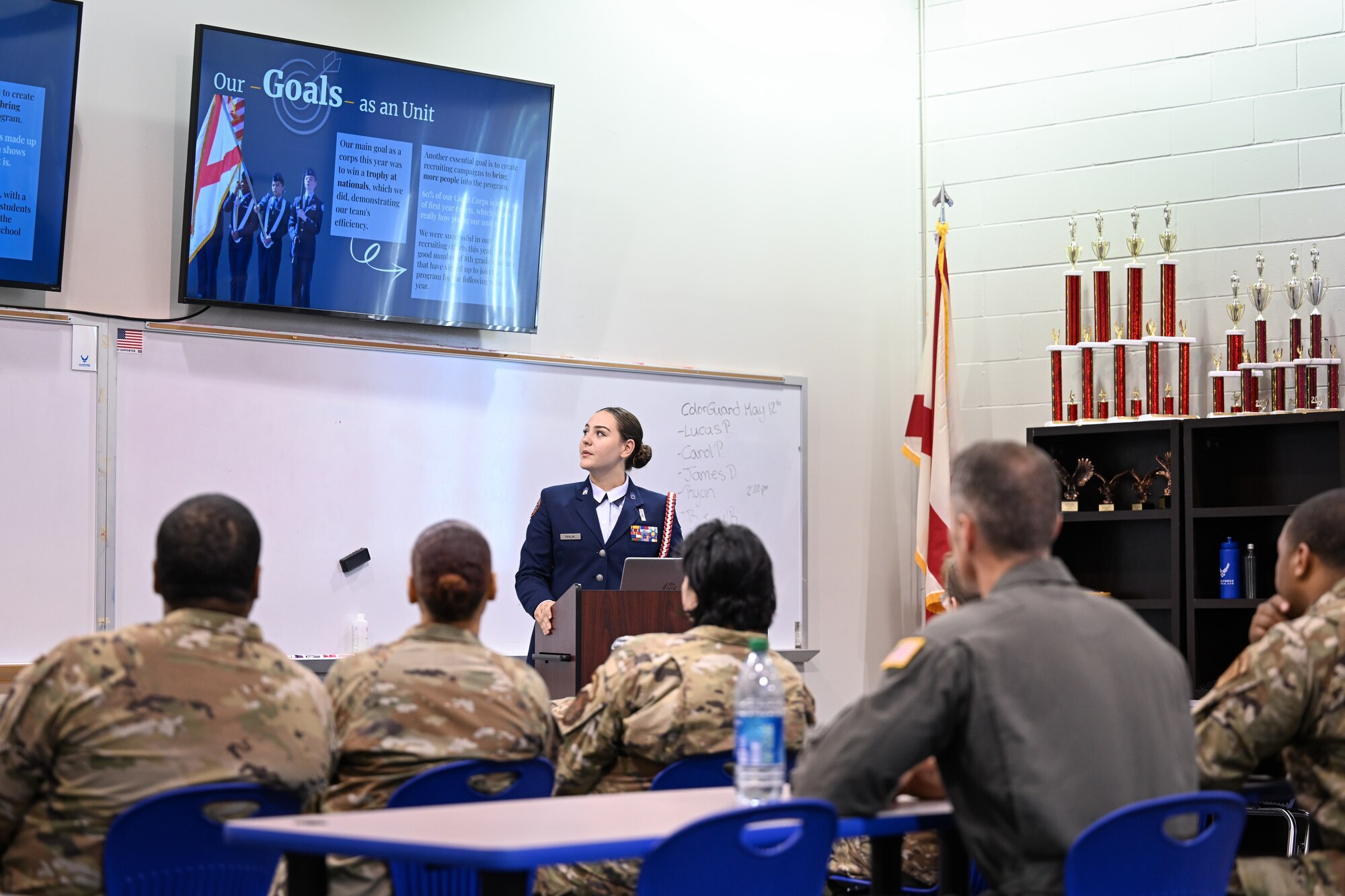 A JROTIC cadet conducts a brief to Air Force leaders and recruiters