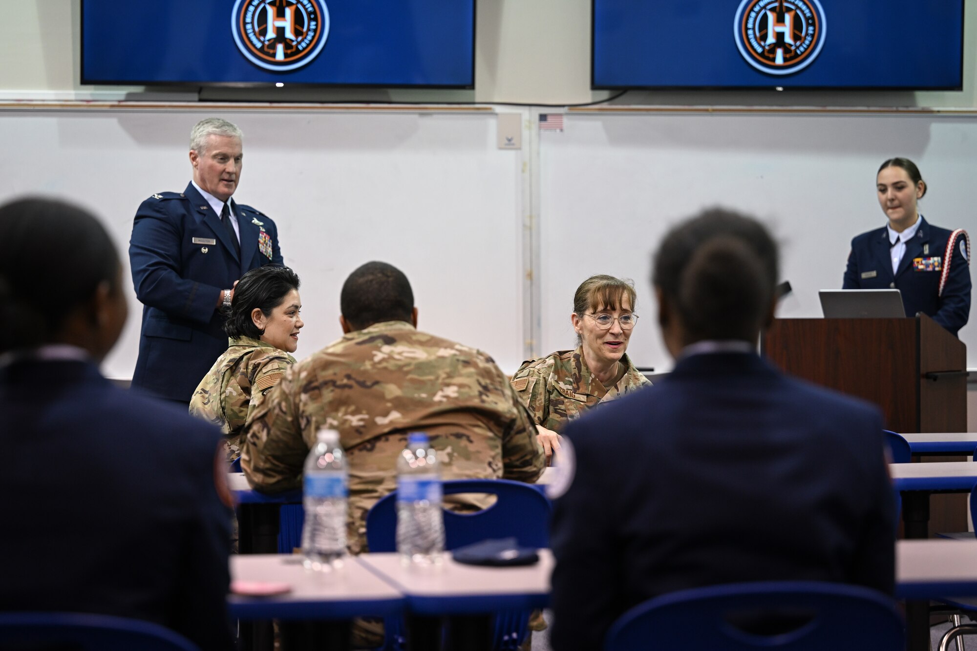 Air Force Recruiting Service Deputy Commander, Brig. Gen. Lisa M. Craig, center, engages with Air Force Junior ROTC cadets