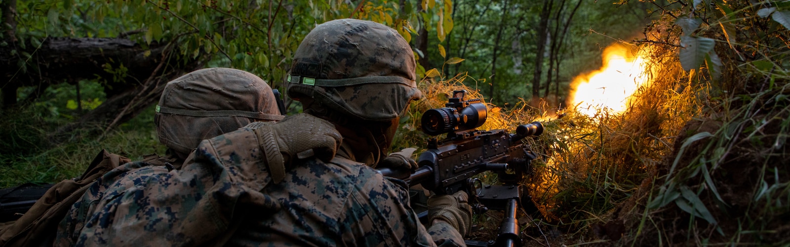 U.S. Marine Corps 2nd Lt. Jack Loucy (right) and 2nd Lt. Alexander Bollmann (left) with 6th Platoon, Echo Company, The Basic School, fire the M240B machine gun during the Field Exercise II on Marine Corps Base Quantico, Virginia, Sept. 29, 2021. FEX II is a routine exercise designed to sharpen the Marines combat capabilities and is an opportunity for the Marines to conduct offensive and defensive operations at the platoon level in preparation for future deployments. (U.S. Marine Corps photo by Lance Cpl. D’Angelo Yanez)