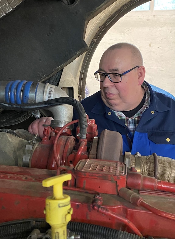 Volker Frey, a heavy mobile equipment repair mechanic and customer service team supervisor for Base Support Operations Maintenance, works on a U.S. Army Garrison Rheinland-Pfalz fire truck at his maintenance facility on Panzer Kaserne in Kaiserslautern, Germany. Frey recently was awarded a Silver Master’s Certificate in recognition for his 25 years as a master mechanic and craftsman.