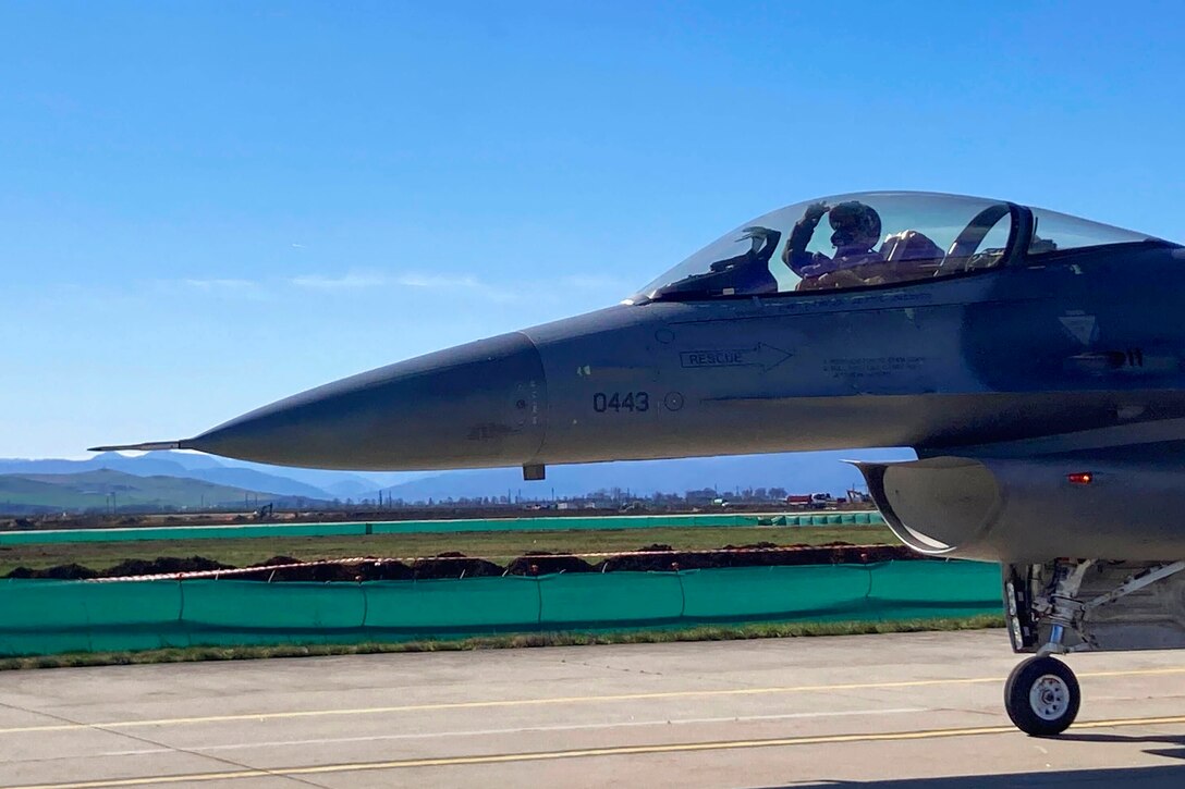 An F-16 Fighting Falcon moves into position before takeoff.