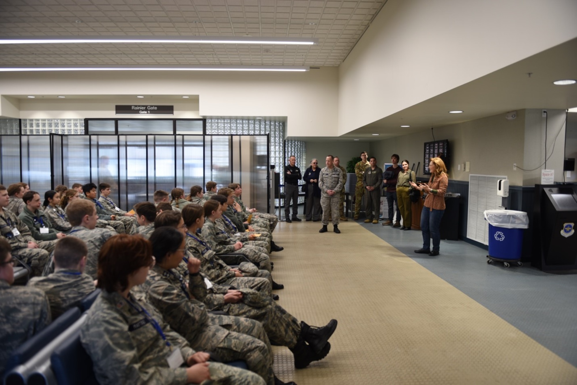 Washington Civil Air Patrol cadets listen to U.S. Rep. Kim Schrier speak during an installation tour April 22, 2023 at Joint Base Lewis-McChord, Washington. The cadets had time for a questions and answer session between their incentive flights on a C-17 Globemaster III assigned to the 62d Airlift Wing. As a Total Force partner and auxiliary of the U.S. Air Force, the Civil Air Patrol is there to search for and find the lost, provide comfort in times of disaster and work to keep the homeland safe. (U.S. Air Force photo by Tech. Sgt. Benjamin Sutton)